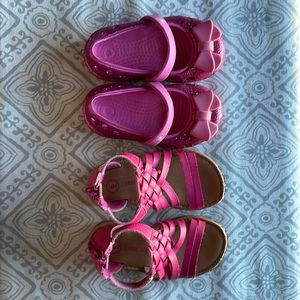 Two pair of pink Toddler girl shoes. Size 6 CROCS and size 6 Cherokee sandles